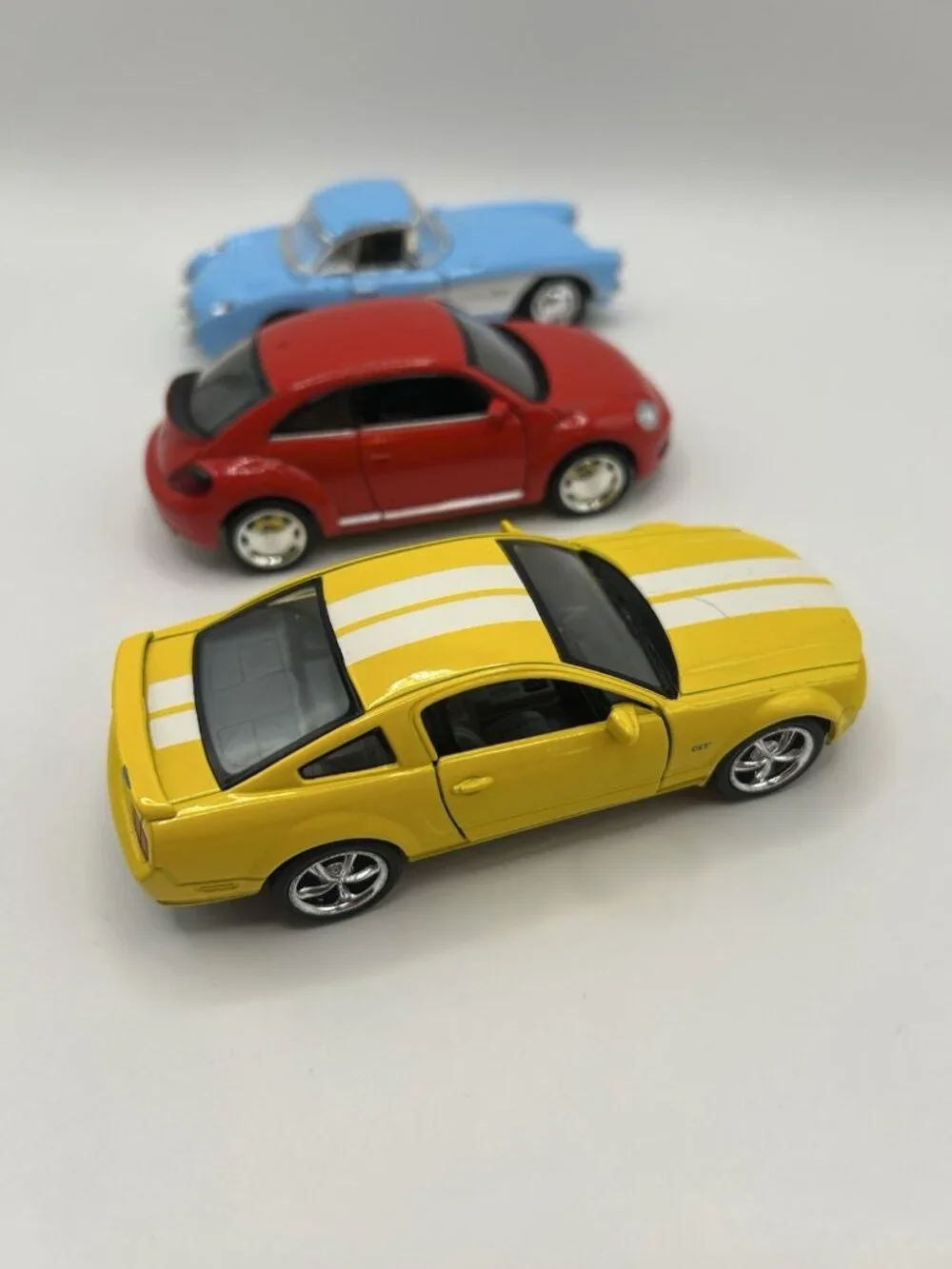 Lot of 3 Diecast Cars Corvette VW Beetle Mustang Kinsmart Scale Blue Red Yellow